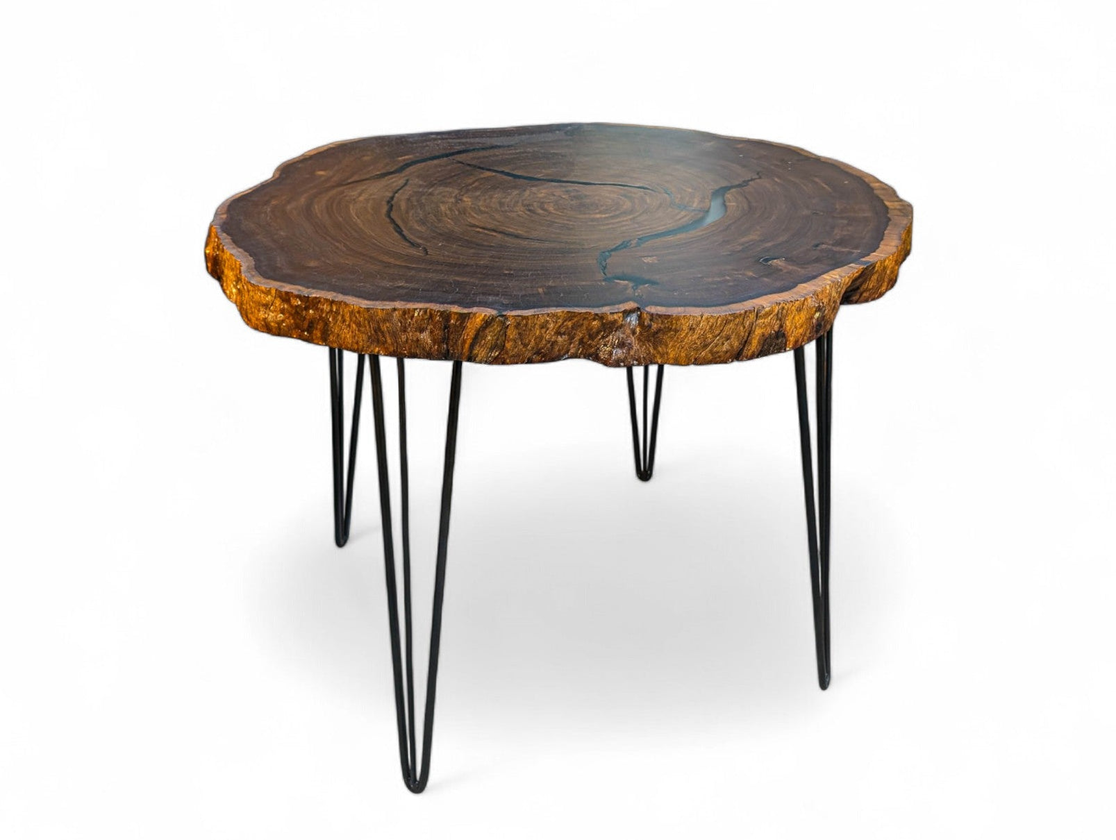 Wooden table with black hairpin legs on a white background
