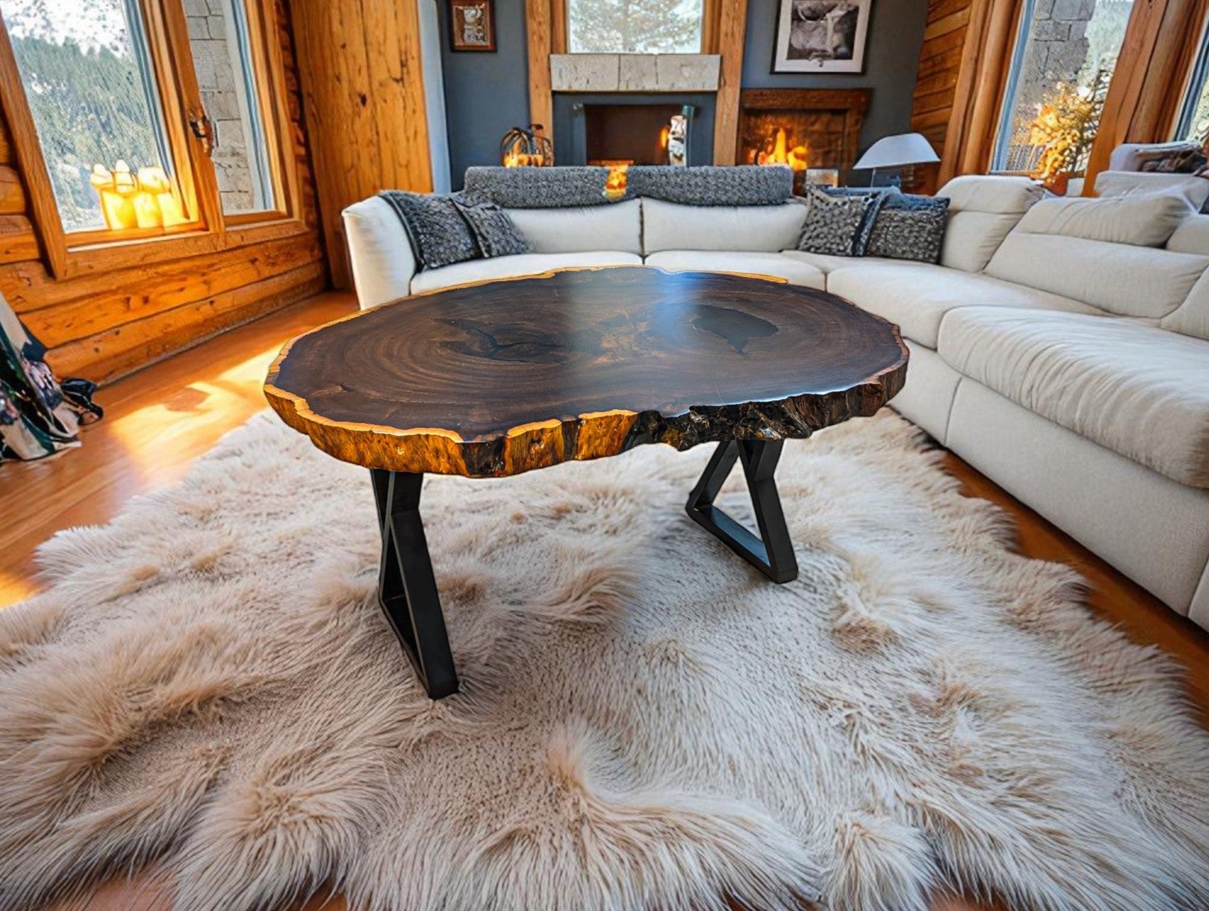 Living room with a wooden coffee table, sectional sofa, and large windows overlooking a snowy landscape.