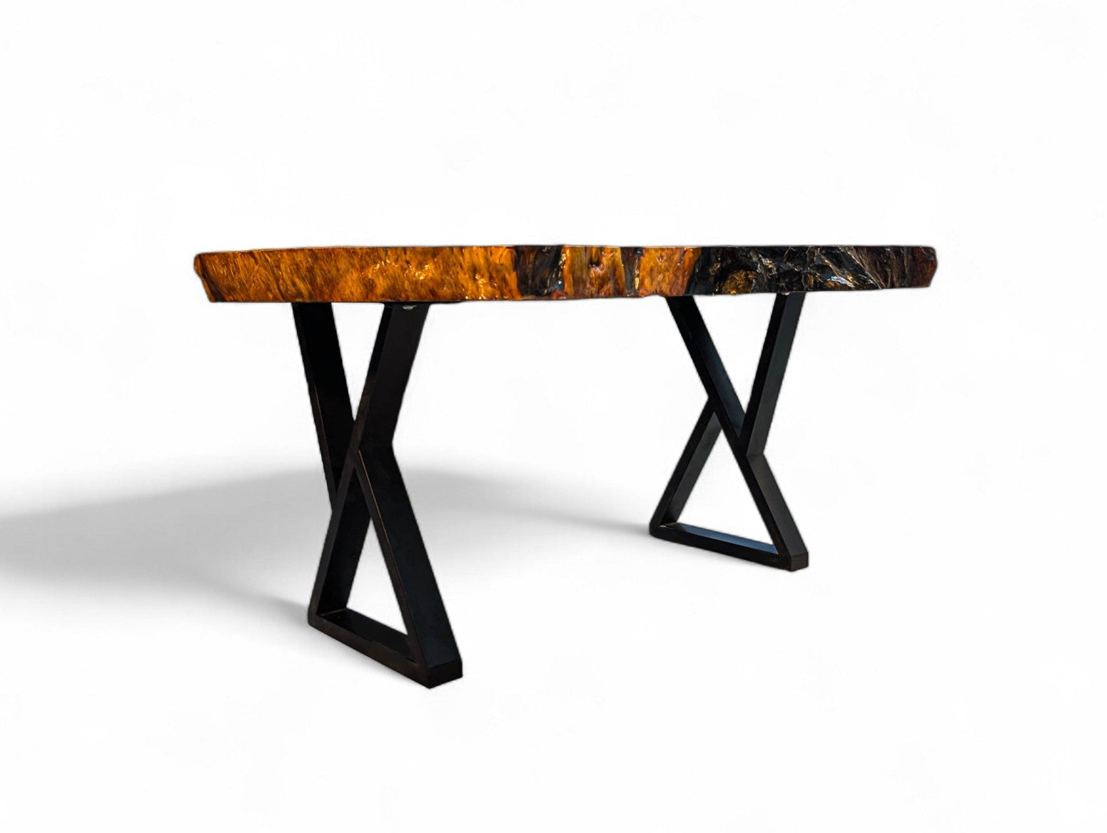 Coffee table with a wooden top and black metal legs on a white background