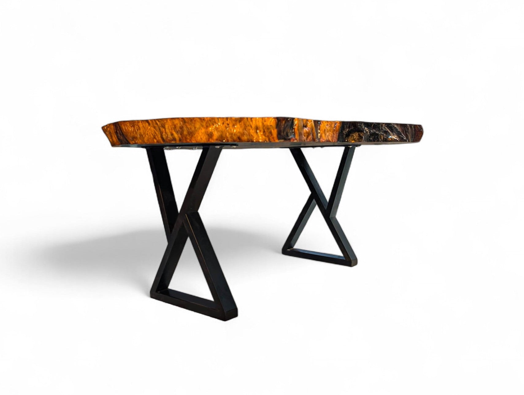 Table with a wooden top and metal legs on a white background