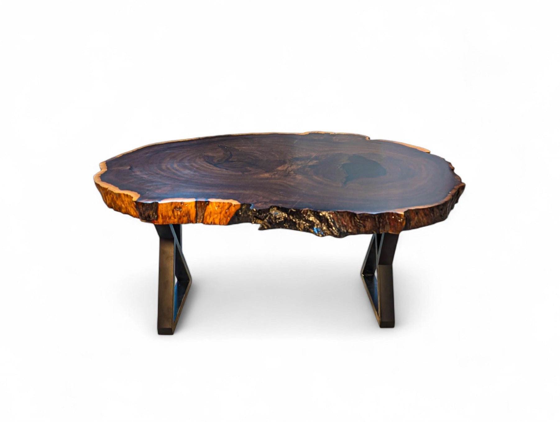 Wooden coffee table with a natural, uneven surface on a white background