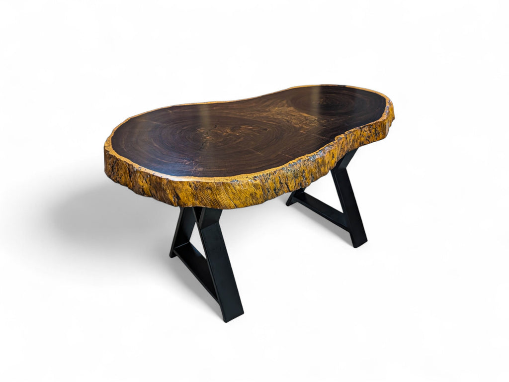 Wooden coffee table with black metal legs on a white background