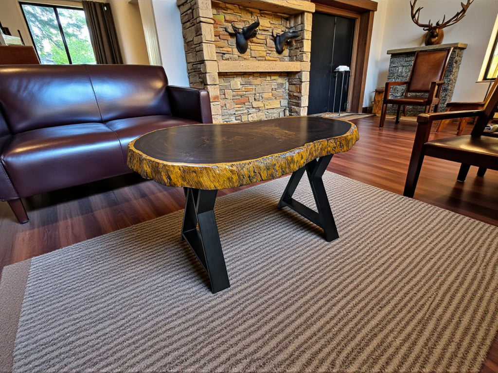 Wooden coffee table in a living room with a fireplace and furniture.