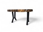 Wooden table with black legs on a white background