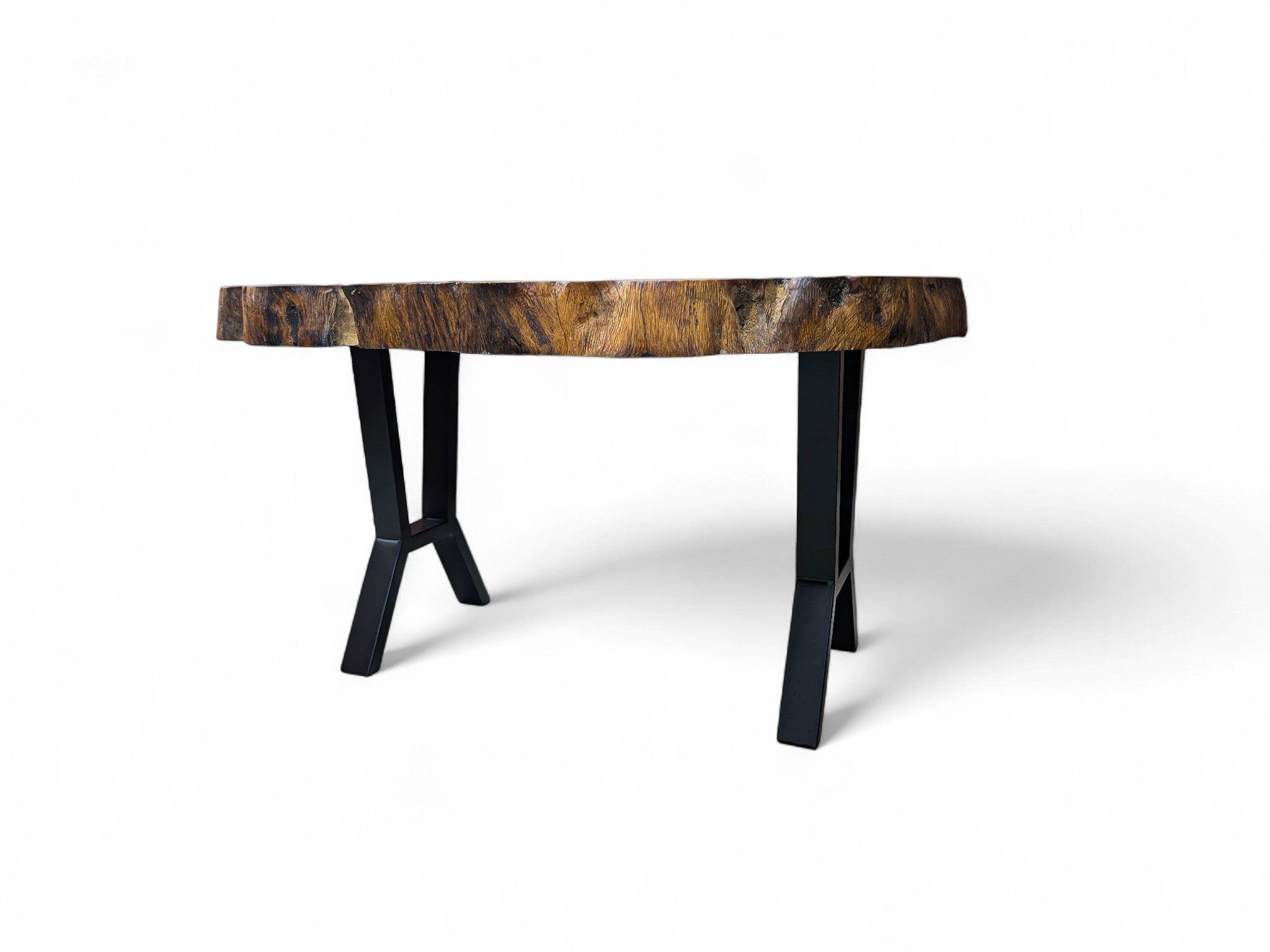 Wooden table with black legs on a white background