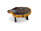 Wooden coffee table with a natural, rough-textured surface on a white background