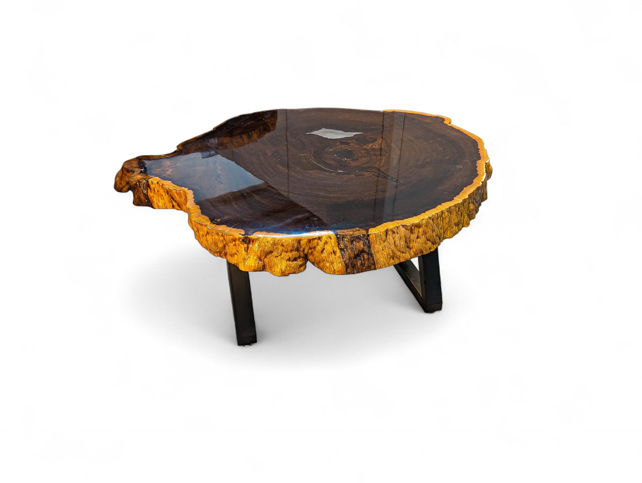 Wooden coffee table with a natural, rough-textured surface on a white background