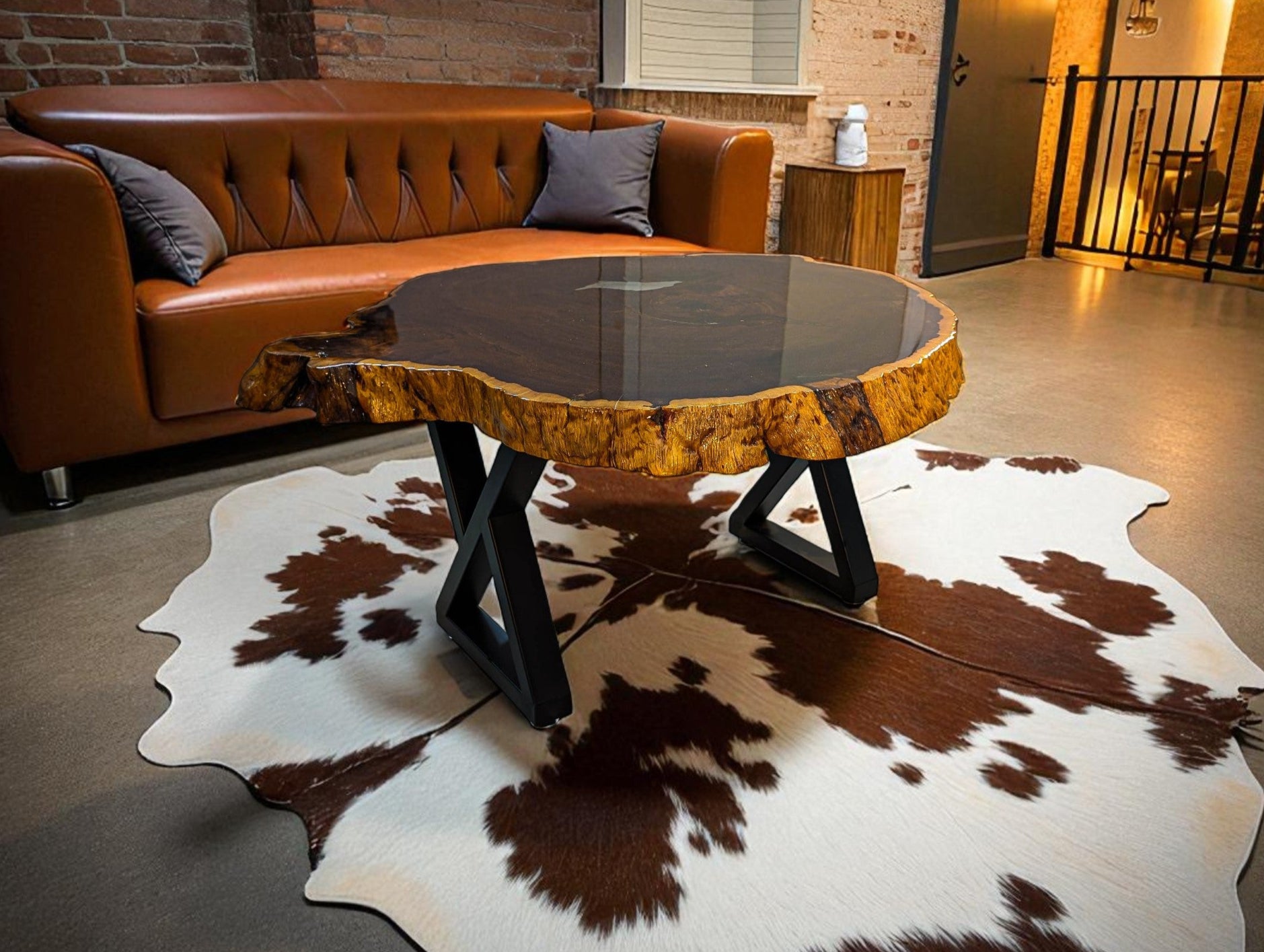 Wooden table in a room with brick walls.
