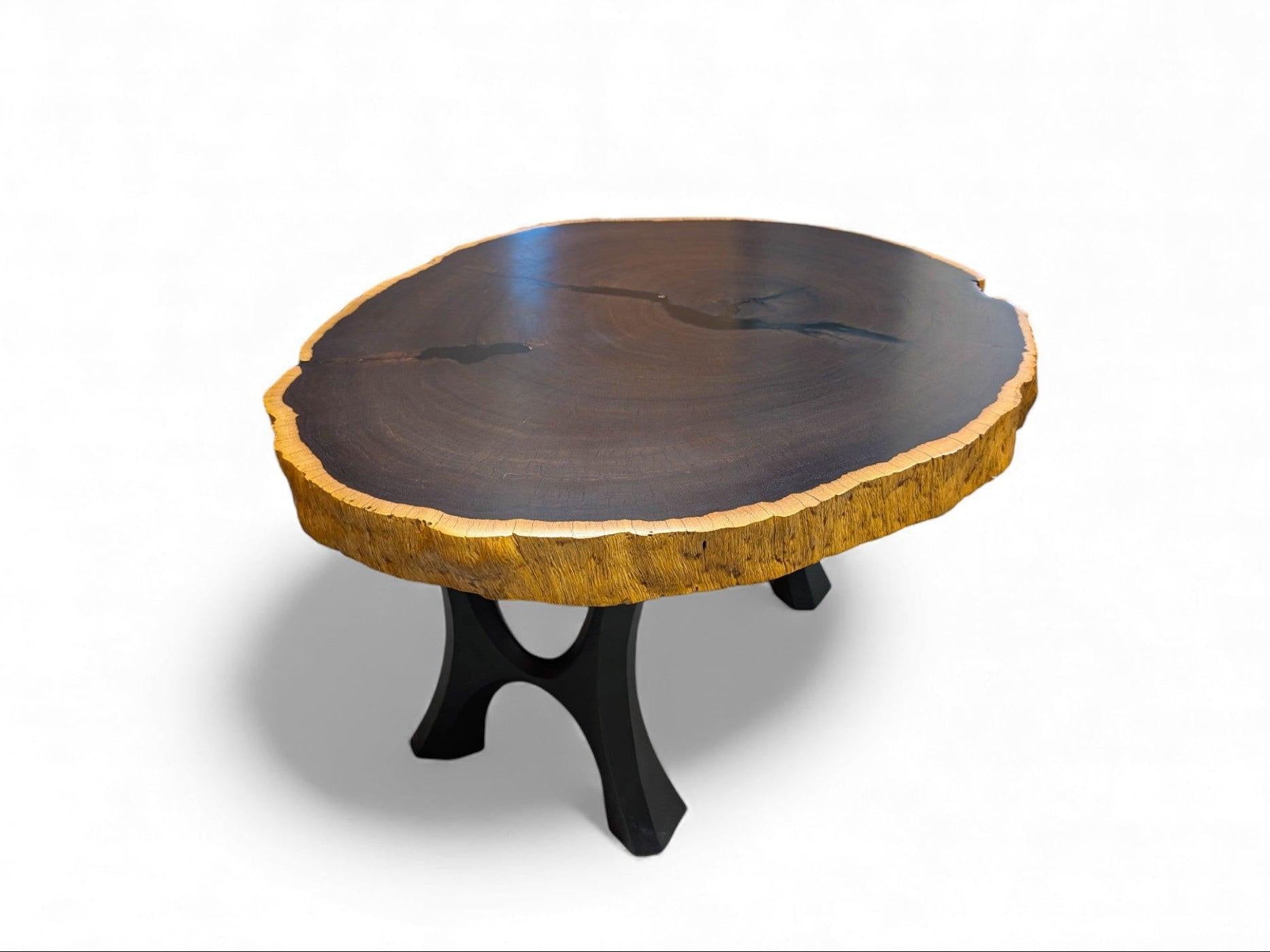 Wooden table with a natural edge on a white background