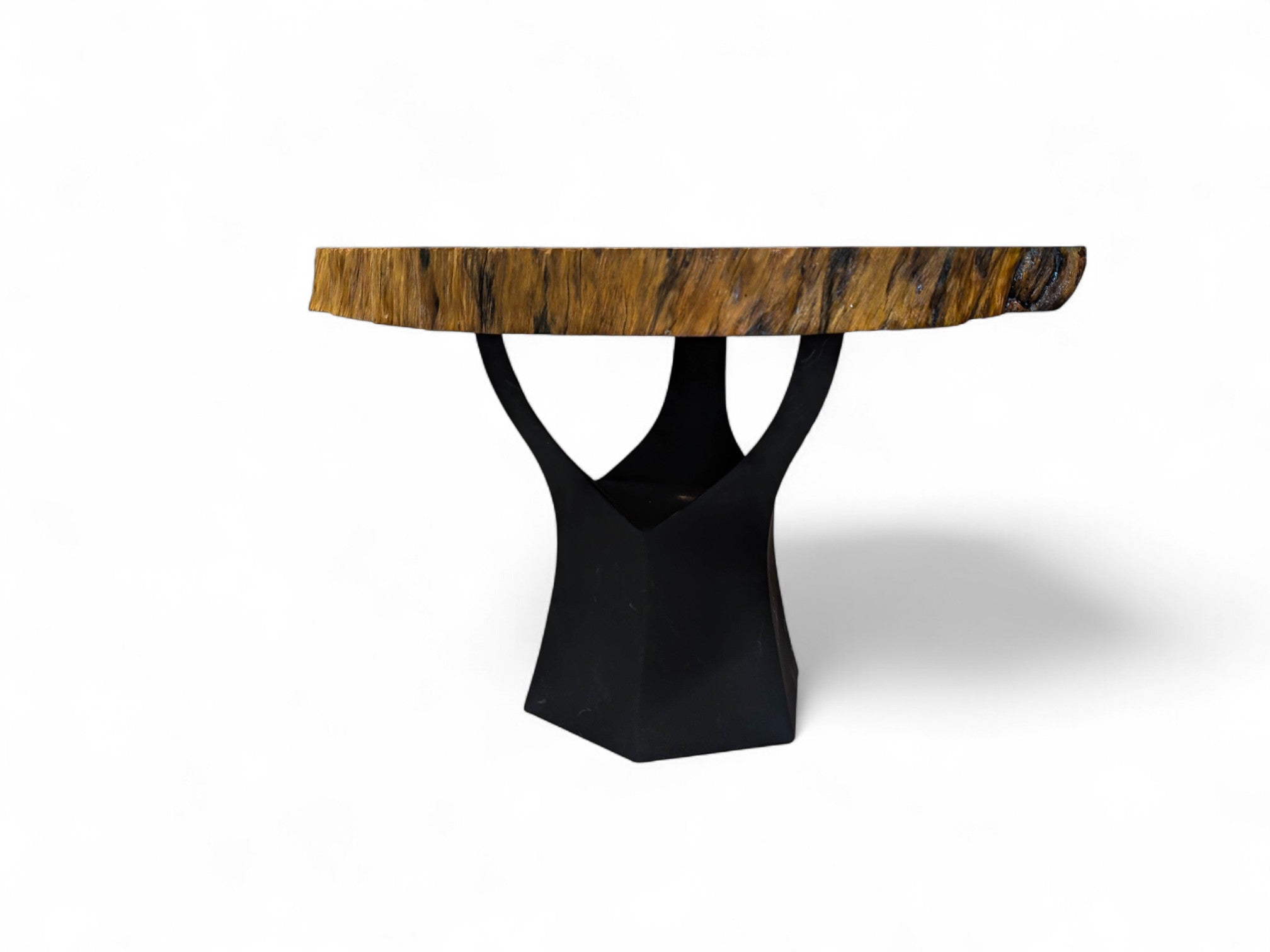 Table with a wooden top and black base on a white background