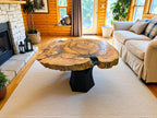 Living room with a wooden coffee table and beige sofa.